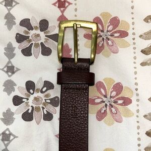 Brown leather belt with gold buckle